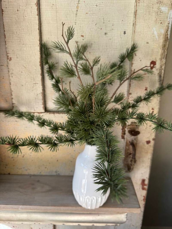 Green in porcelain vase