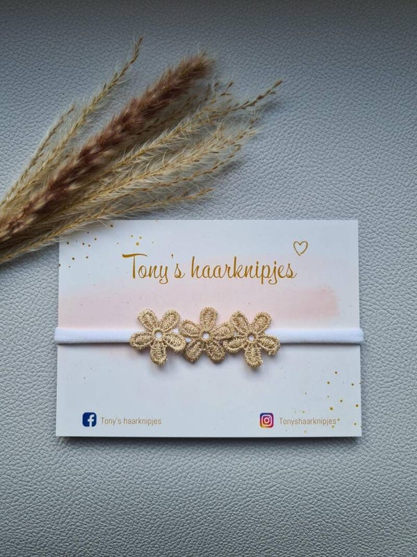 Nylon haarbandje wit met gouddraad bloemen