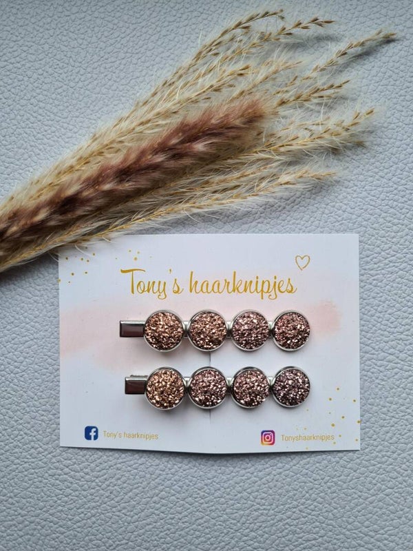 Alligatorclip met 4 glitter stenen rosé