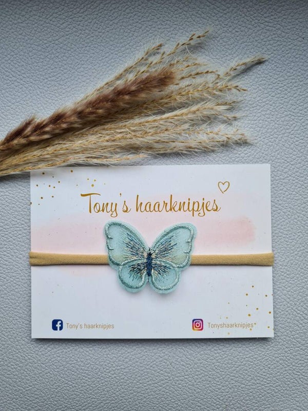 Nylon haarbandje met vlinder nude/mint