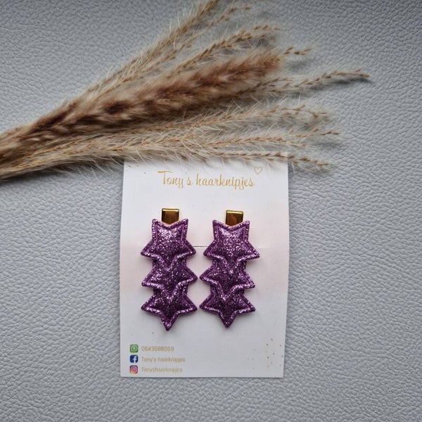 Alligatorclip met glittersterren lila
