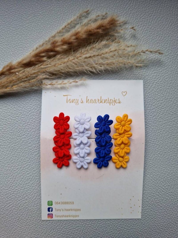 Alligatorclip met bloemen rood/wit/blauw/oranje