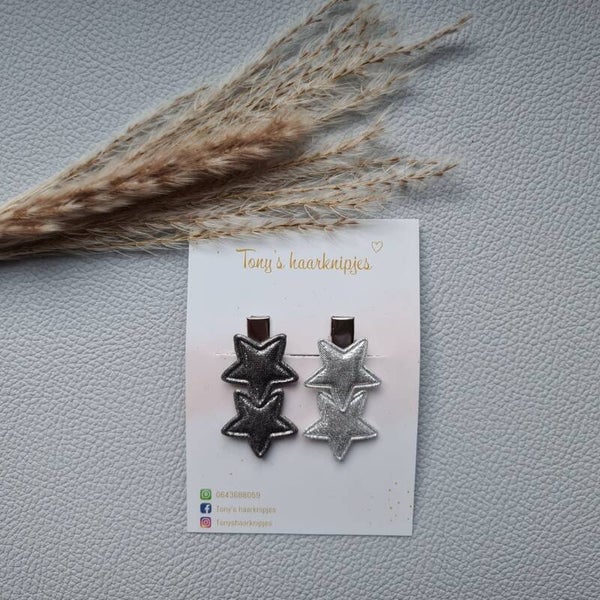 Alligatorclip met sterren antraciet/zilver