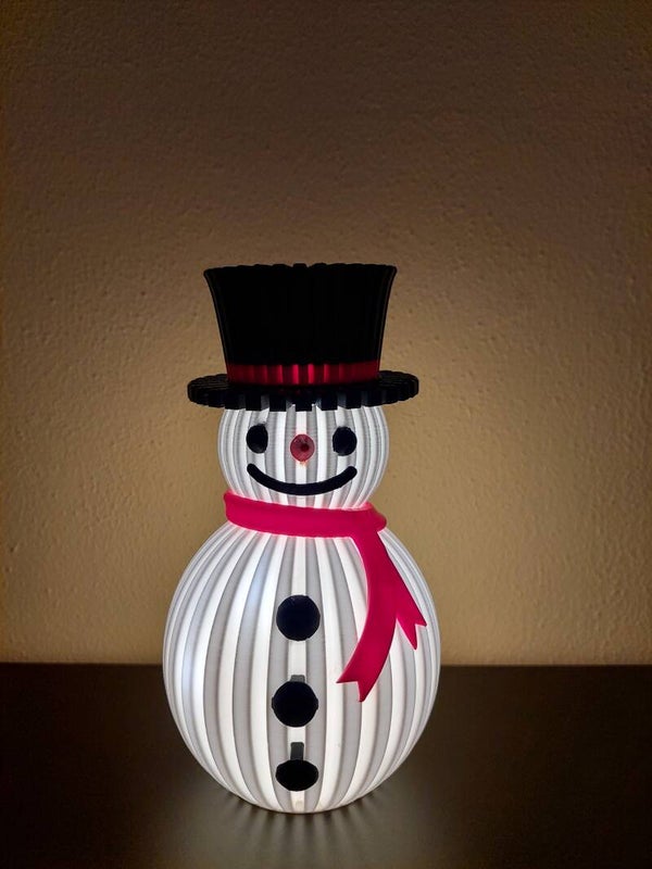 Lichtgevende Sneeuwpop – Breng de winterse gezelligheid in huis!