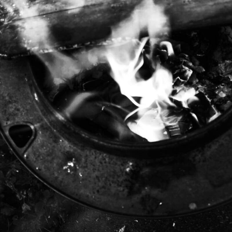 A poppet goes into the ceremonial fire 