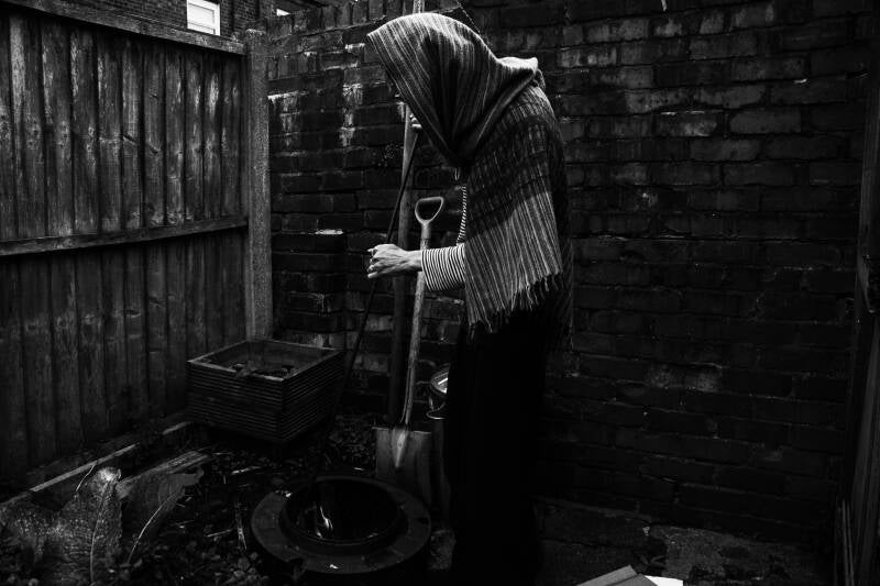 The witch stirs her cauldron 