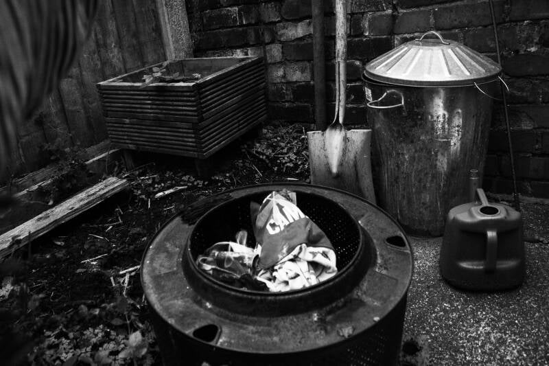 Pyjamas go into the ceremonial fire 