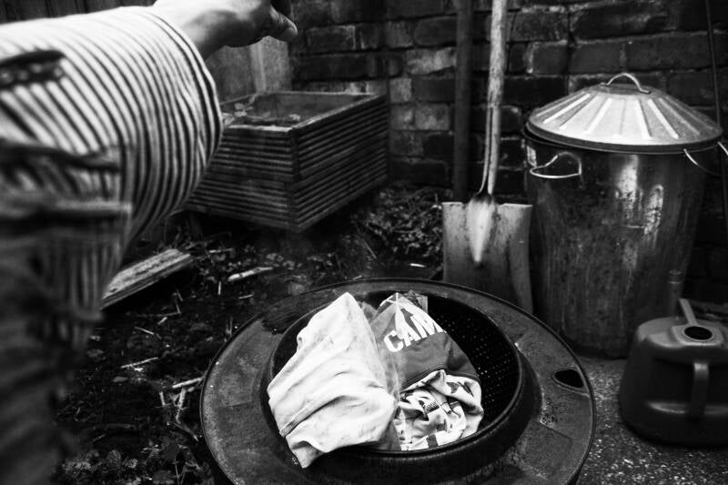 Pyjamas go into the ceremonial fire 