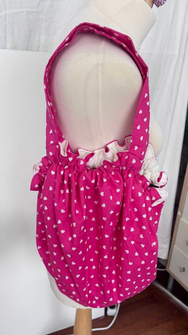 Roze 2-in1 zwemtas-omkleedmat met witte hartjes