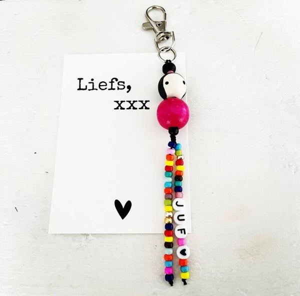 Sleutelhanger juf roze