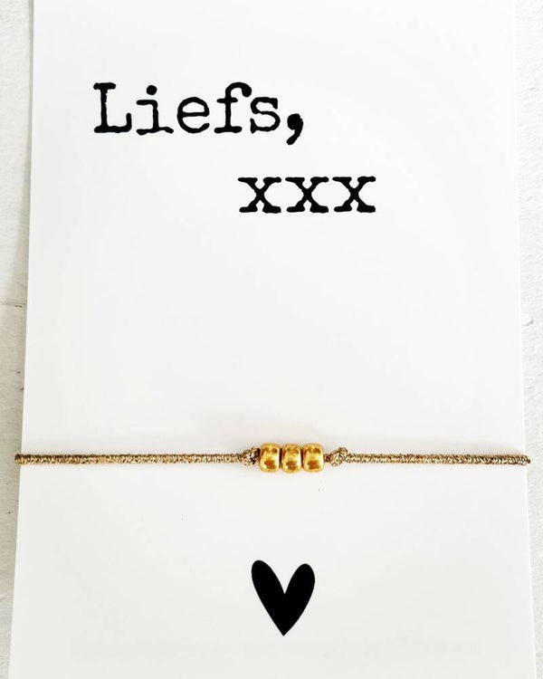 Kaart met goud elastisch armbandje