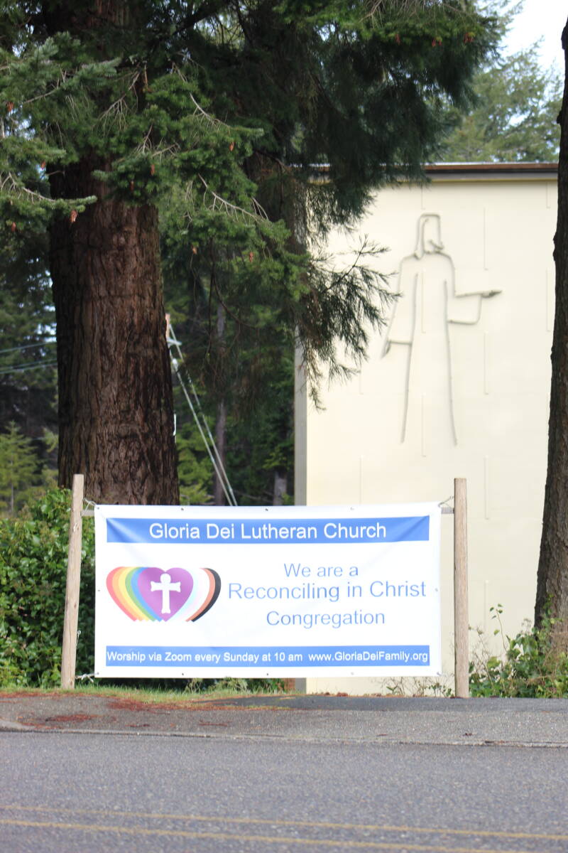 Church with sign saying "We are a Reconciling in Christ Congregation" 