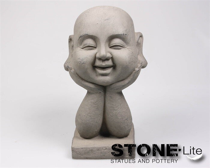 Boeddha hoofd op hand