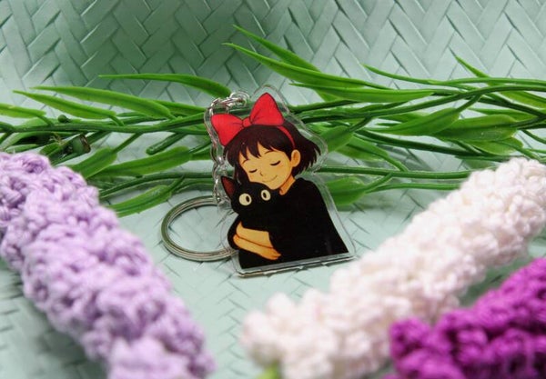 Porte-clé - La jeune apprentie sorcière et son chat noir