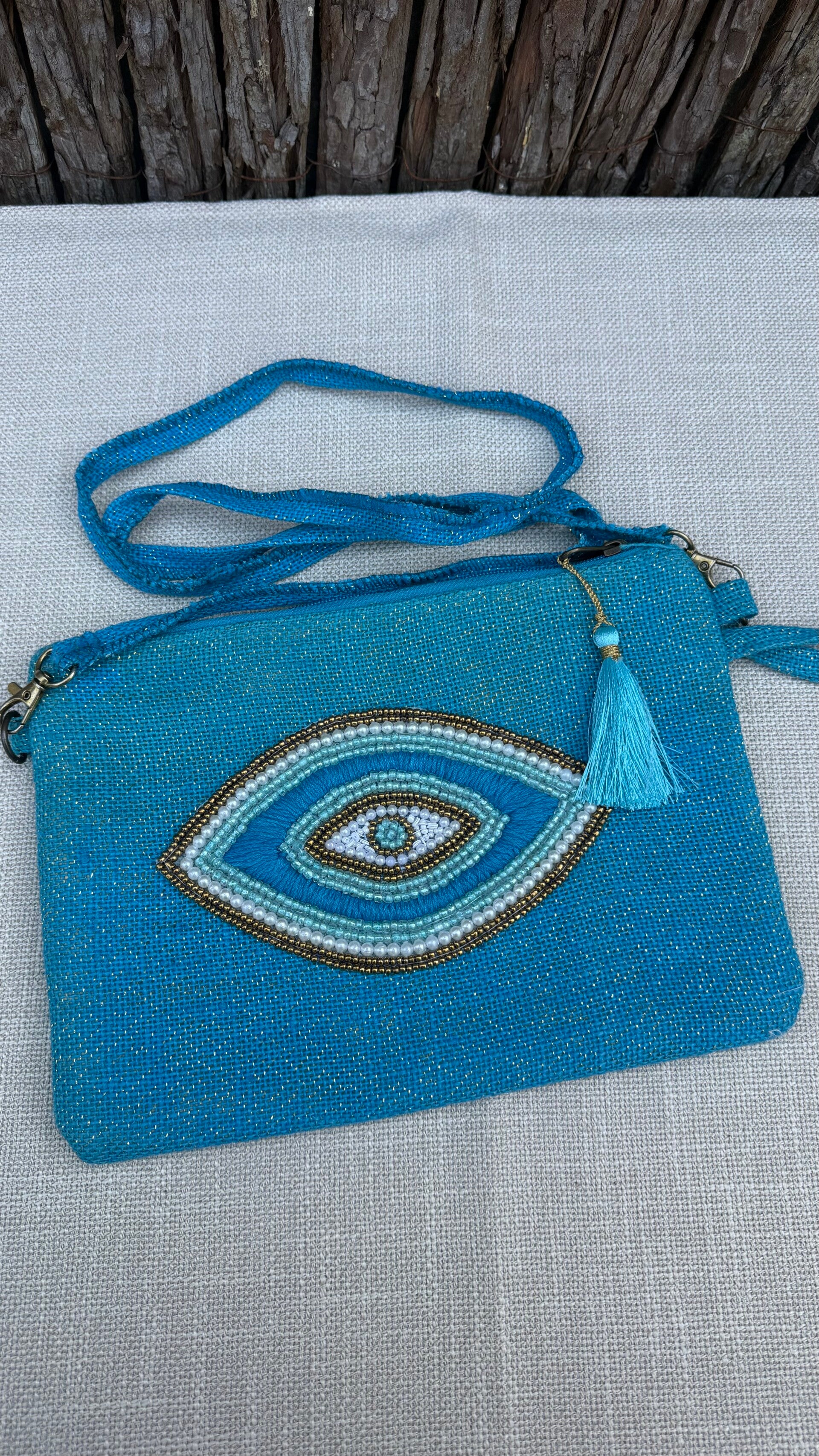 Pochette œil - turquoise