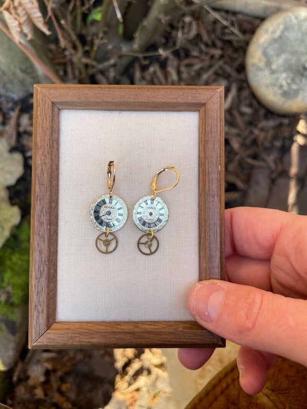 Oorbellen met wijzerplaatje