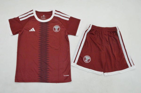 Completo calcio casa bambino Qatar 2026