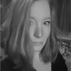 Black and white portrait of Sofia Yorke, indie poet and author from Fryslân, The Netherlands, captured in moody lighting.