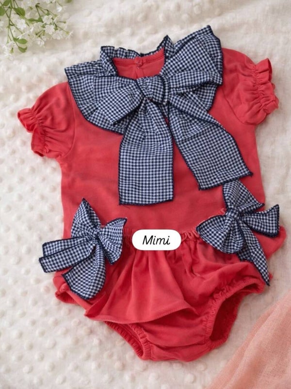 Conjunto lazo fucsia