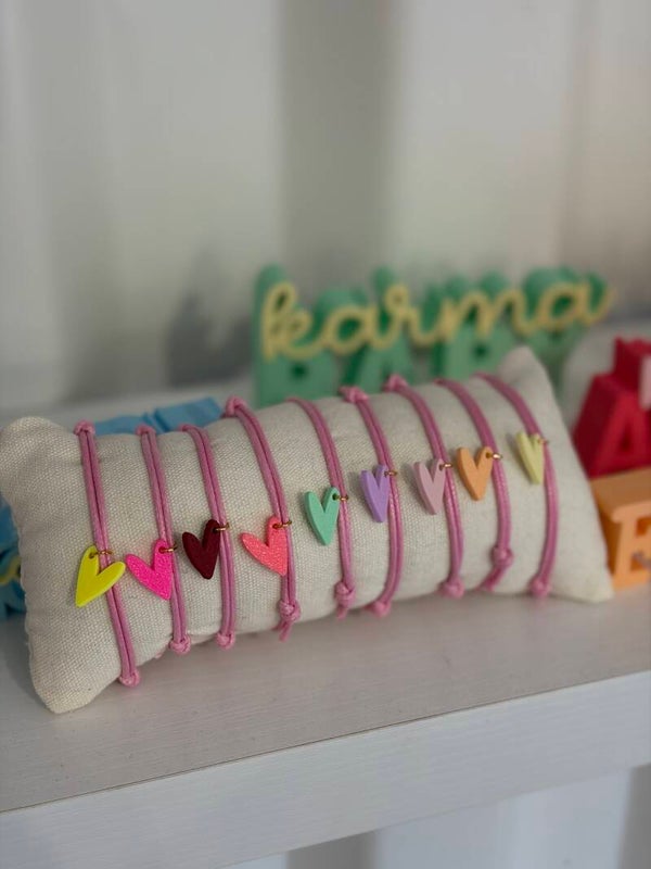 Roze armbandje met geprint hartje