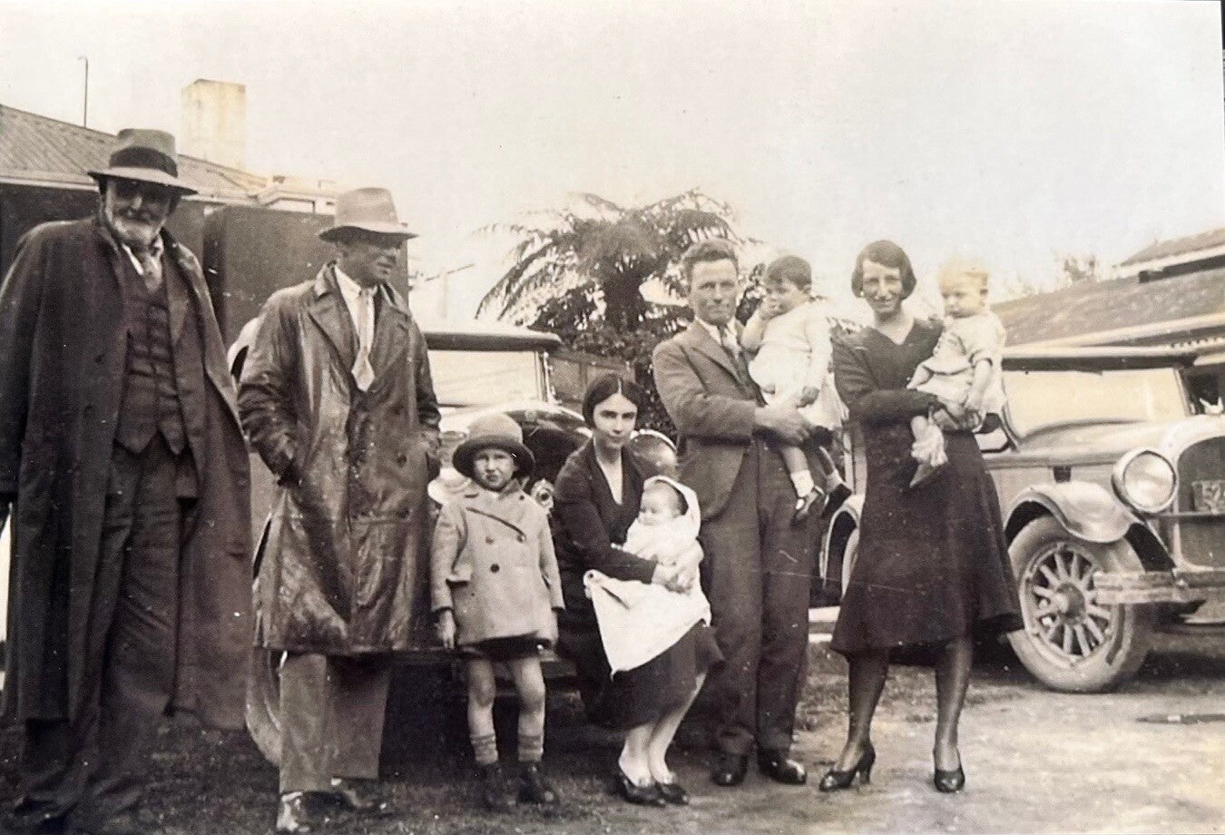 Thomas standing on left. Willie and Lorna Hegarty standing on right with 4 of their children (probably John, Tim, Naomi and Juliet)