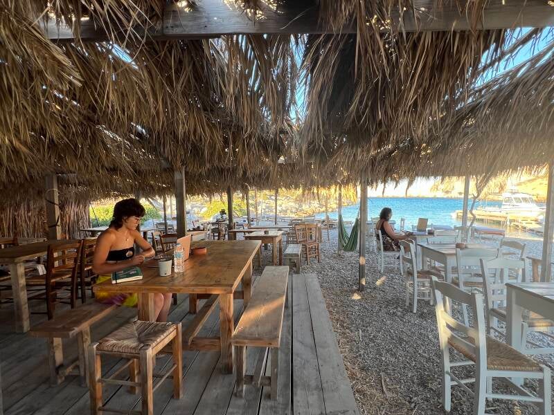 digital nomads working on the beach