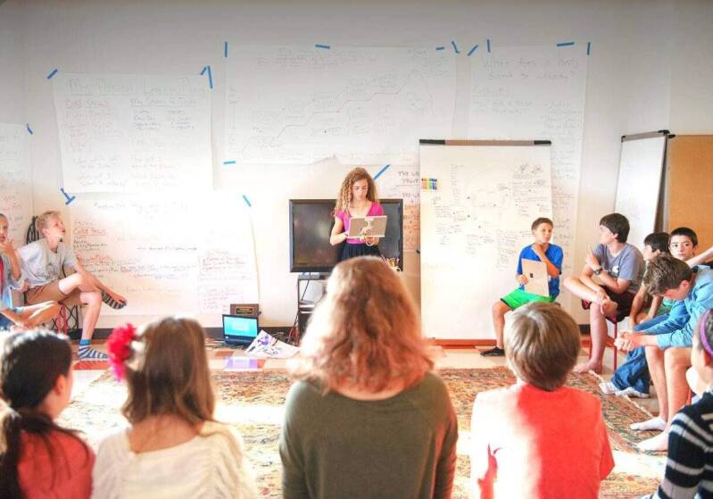 middle school student leading a discussion in Logan Utah