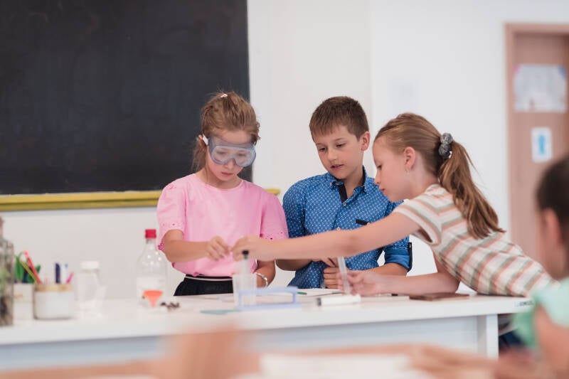 Elementary School students learning in a science lab