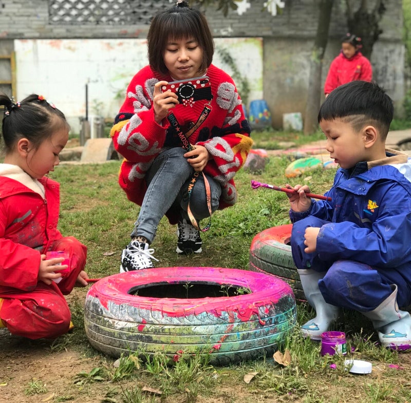 Montessori school students painting