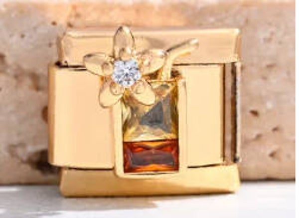 Gold cocktail charm