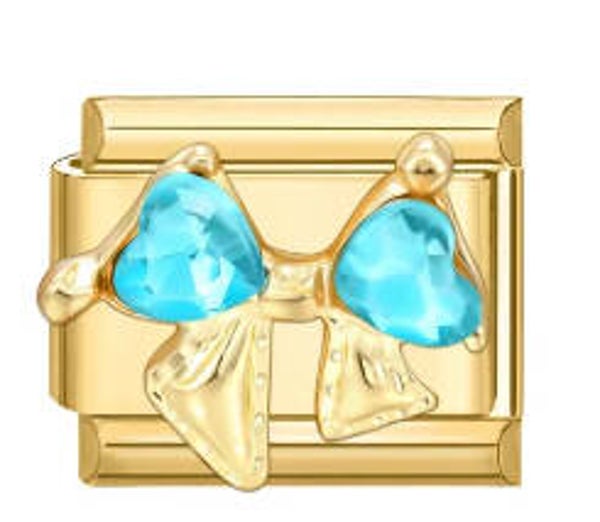 Gold bow charm