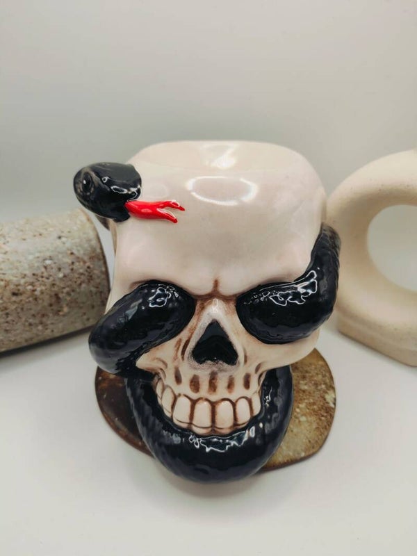 Brûleur tête de mort serpent