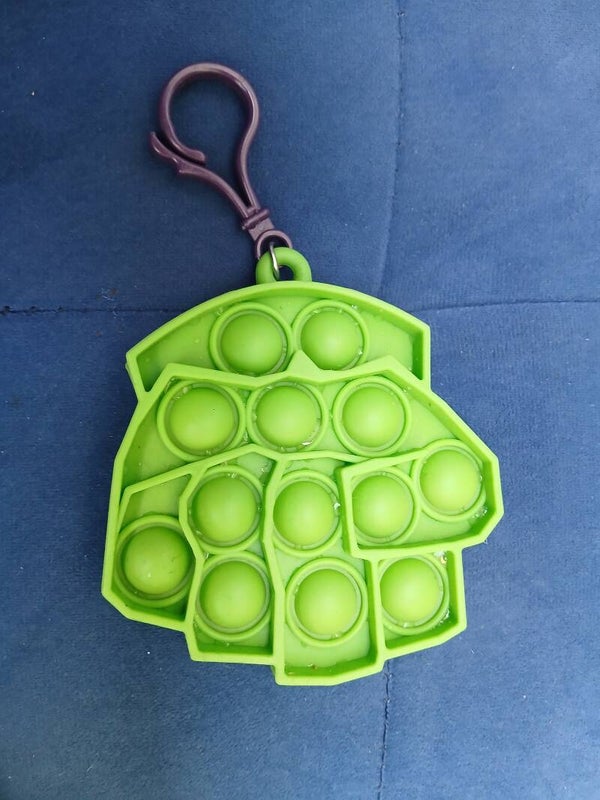 Green key ring hand