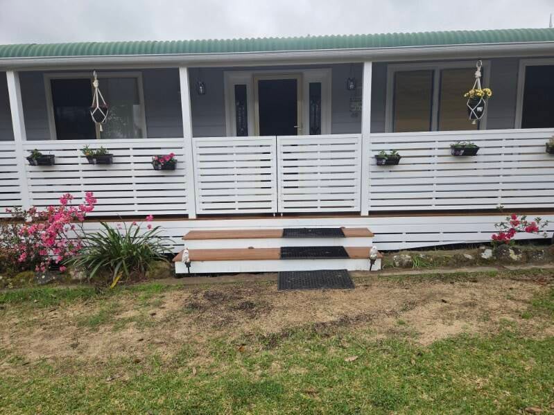Morisset — completed verandah, painted screening and timber steps