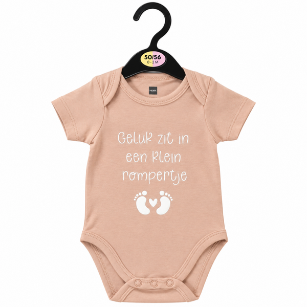 Romper roze maat 50/56