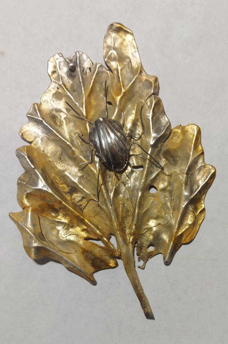 Cast pewter and/or lead alloy with spoon bug