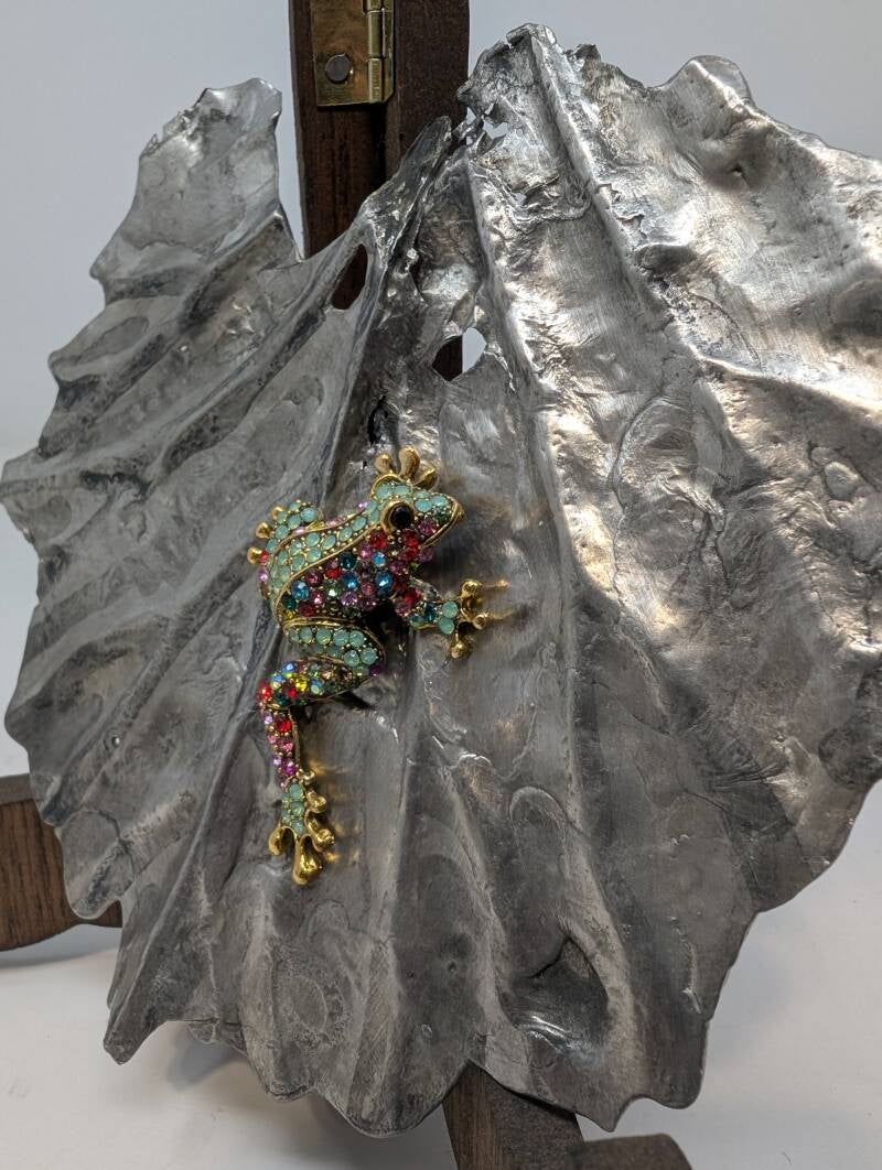 Cast pewter and/or lead alloy with costume broach