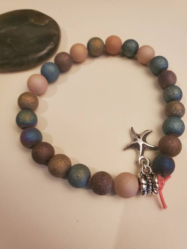 bracelet perles fêtes breloque étoile magnétisé