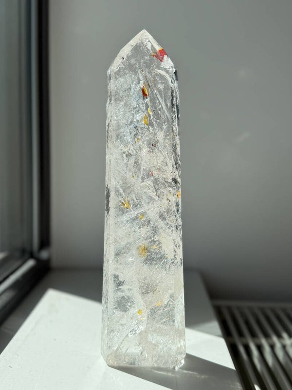 Bergkristal met hematiet punt XL