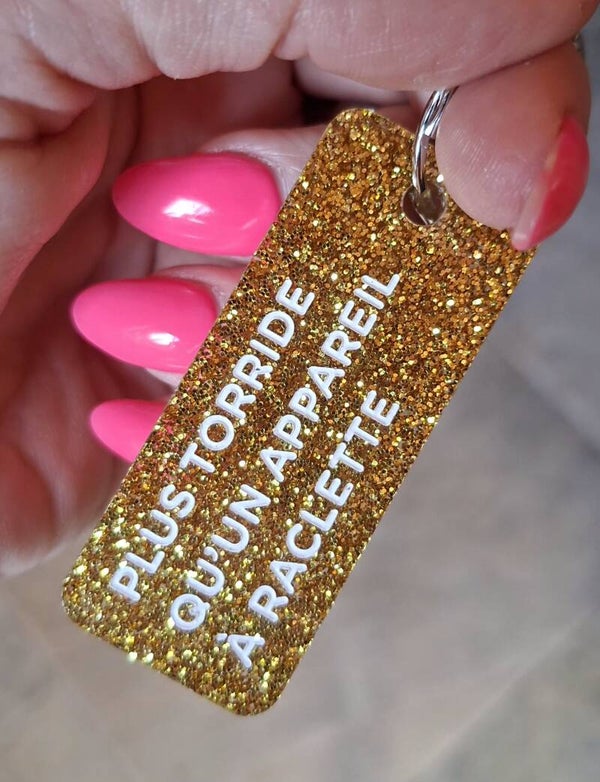 Porte clé paillette PLUS TORRIDE QU'UN APPAREIL À RACLETTE