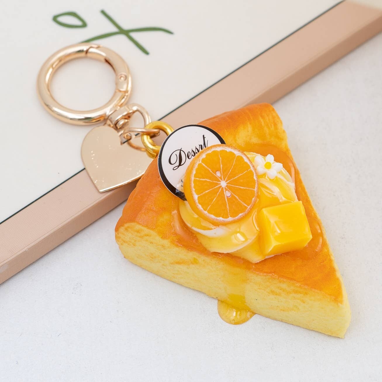 Porte clé / bijou de sac tarte orange / mangue