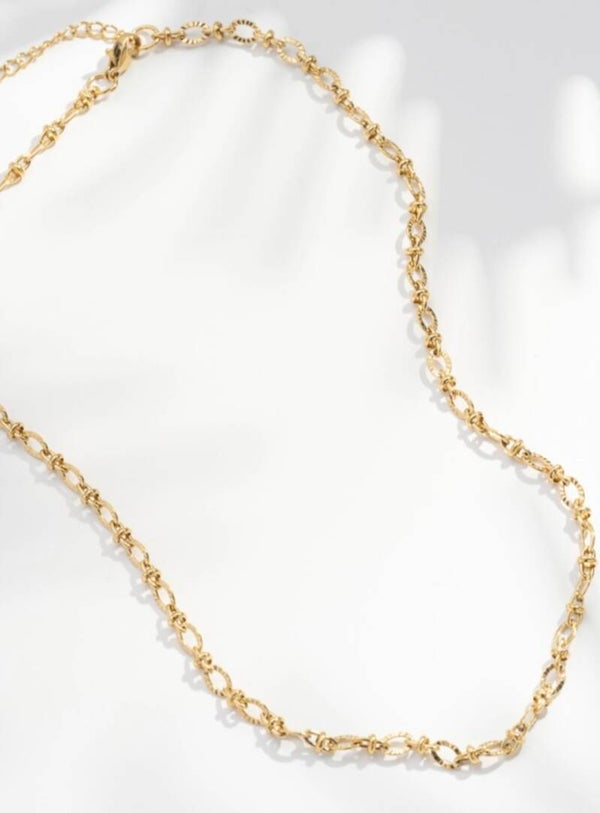 Collier à charms effet martelé