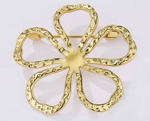 Broche fleur vide