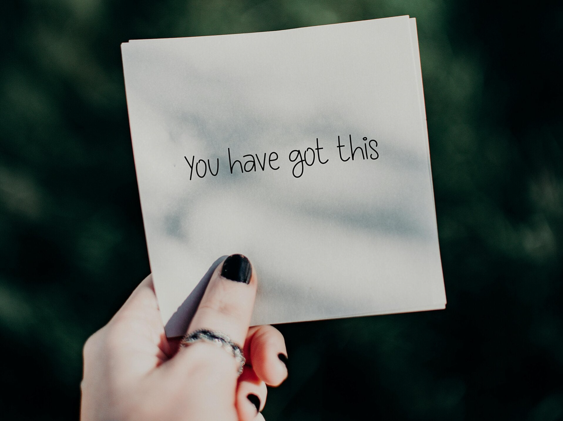 paper sign saying you got this
