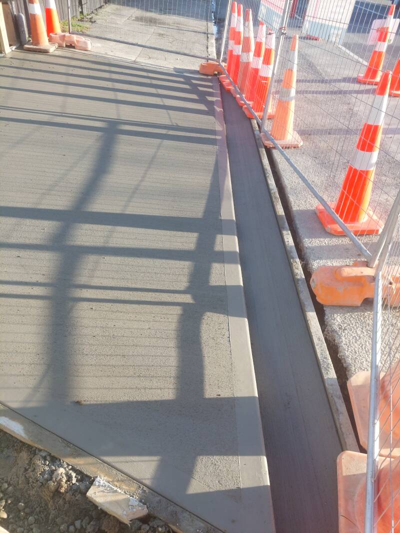 Newly concreted driveway splay
