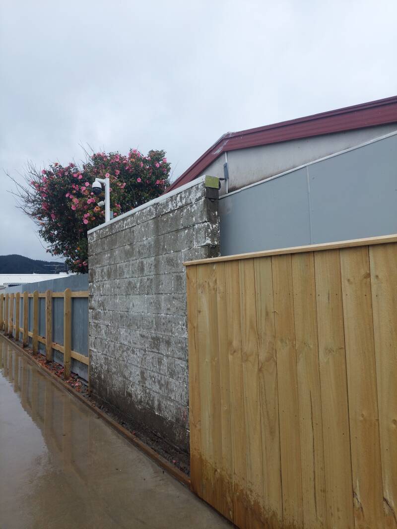 Pailing fence to extend from block wall