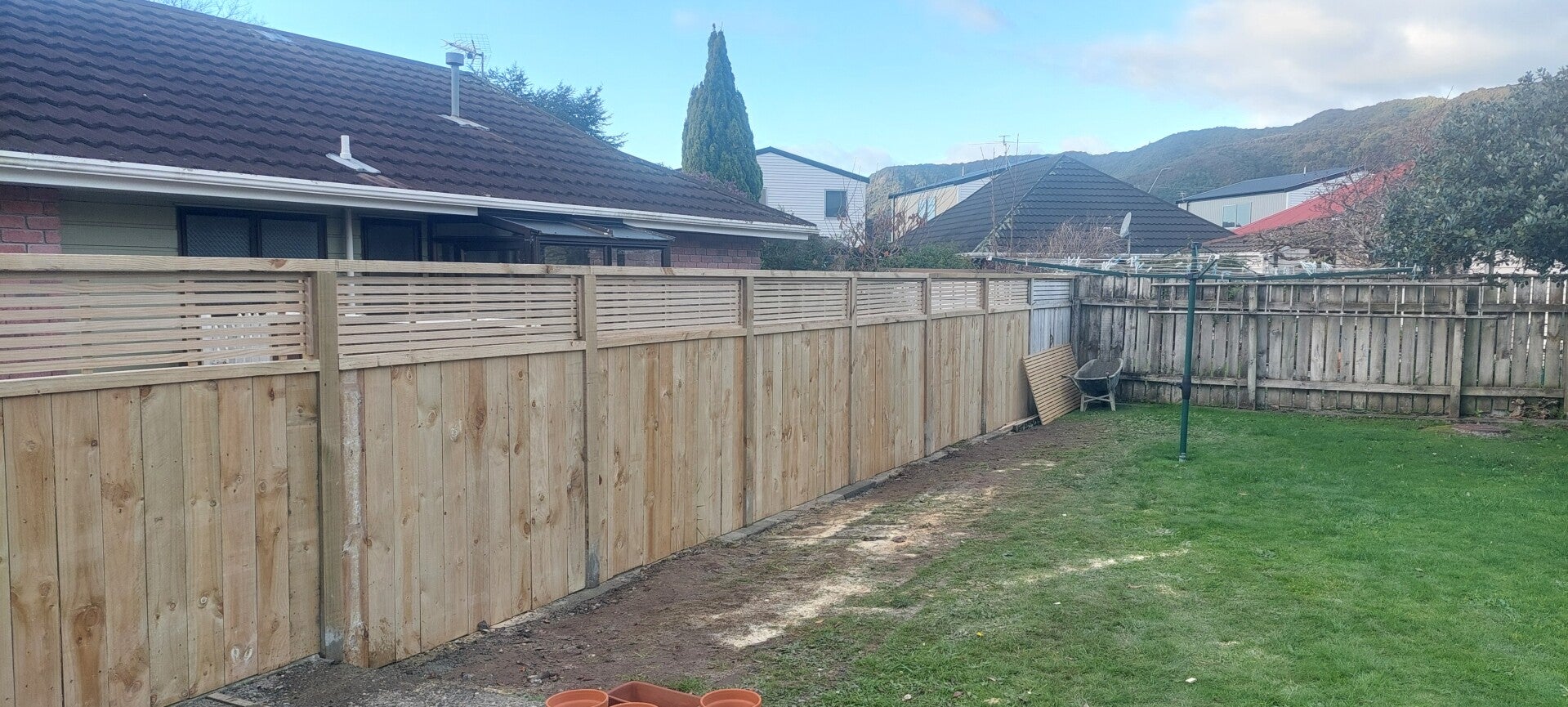 Fence with trellis topper