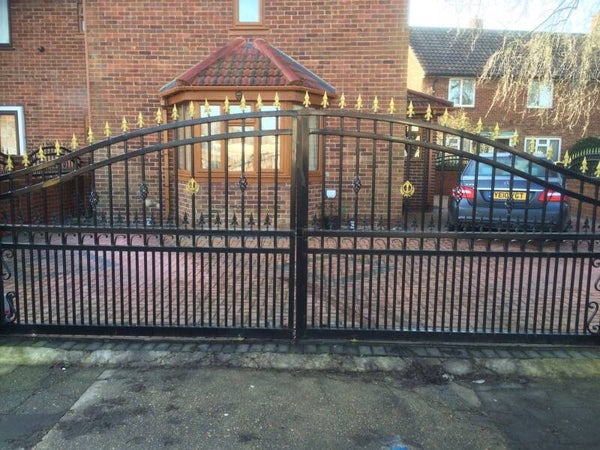 Black sliding front gate
