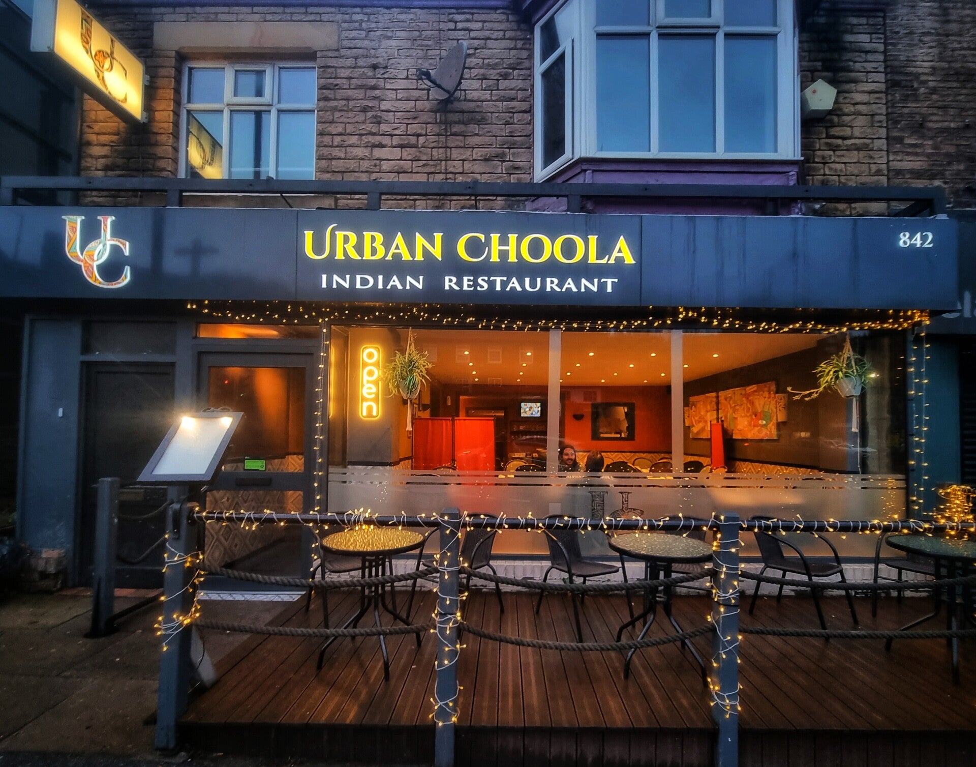 Holt Bar and Kitchen from outside full of people enjoying a night out