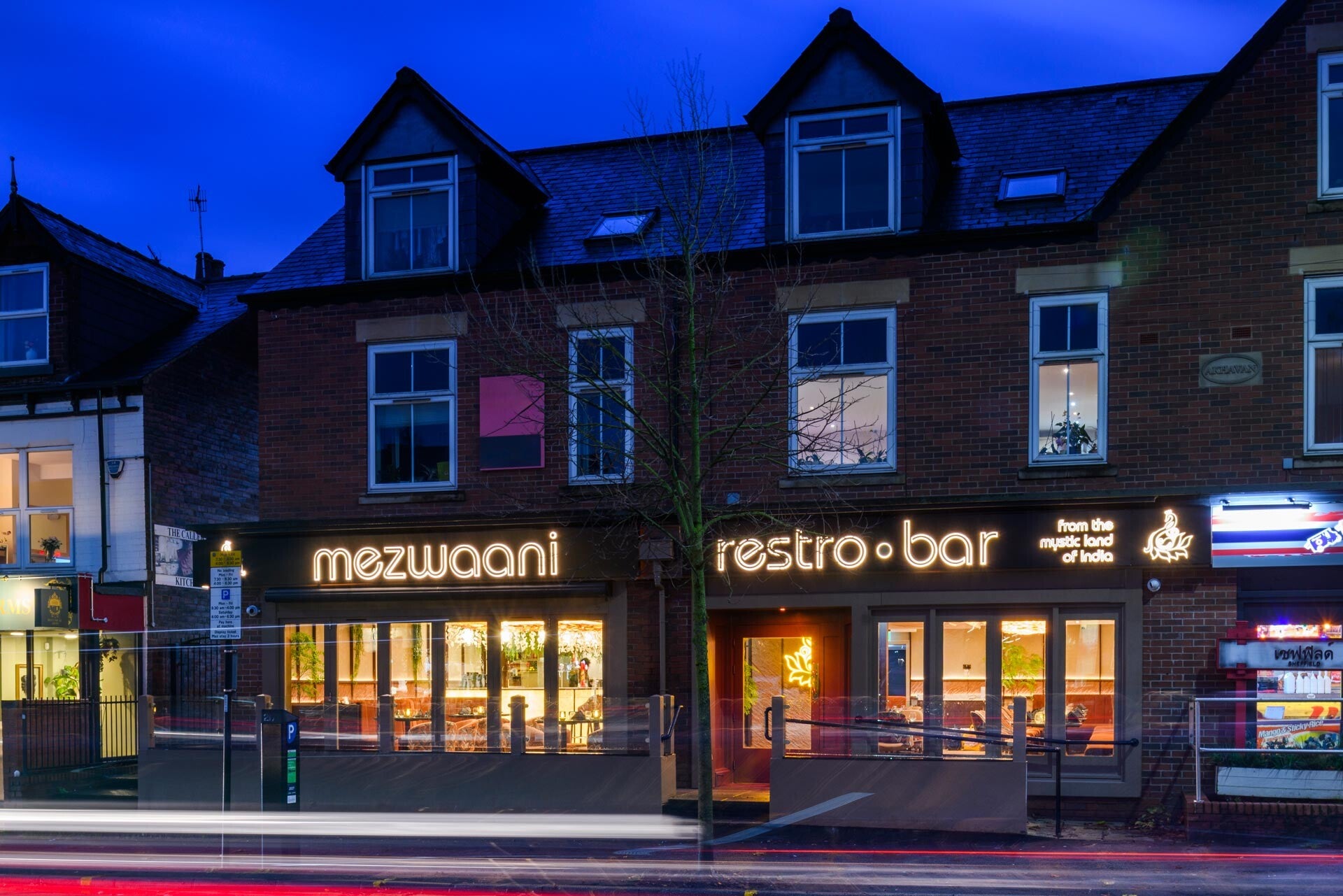 Holt Bar and Kitchen from outside full of people enjoying a night out